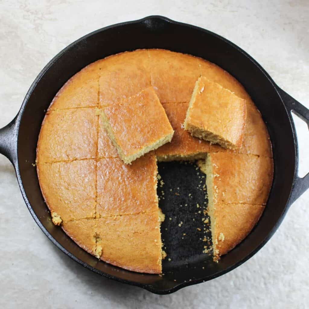 dairy free cornbread in a cast iron skillet feature photo