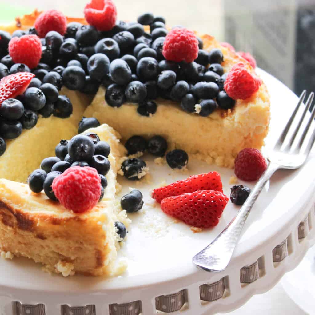 gluten free passover cheesecake with a slice removed