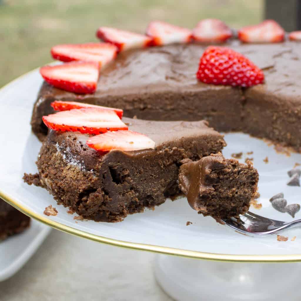 slice of chocolate mousse cake with a piece on a fork