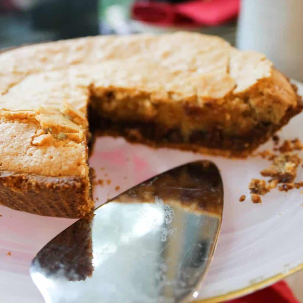 whole cookie pie with a slice removed