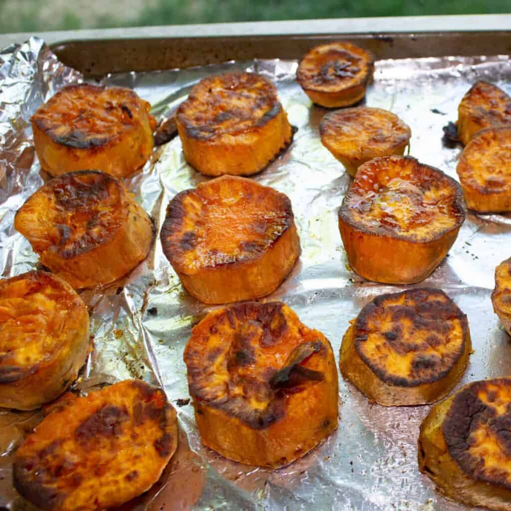 sweet potato medallions on a baking sheet