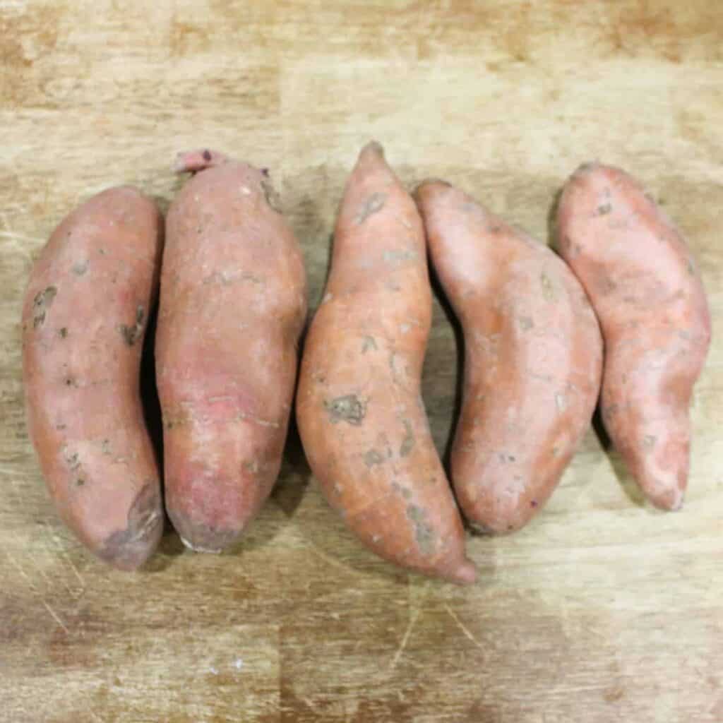 raw unpeeled sweet potatoes