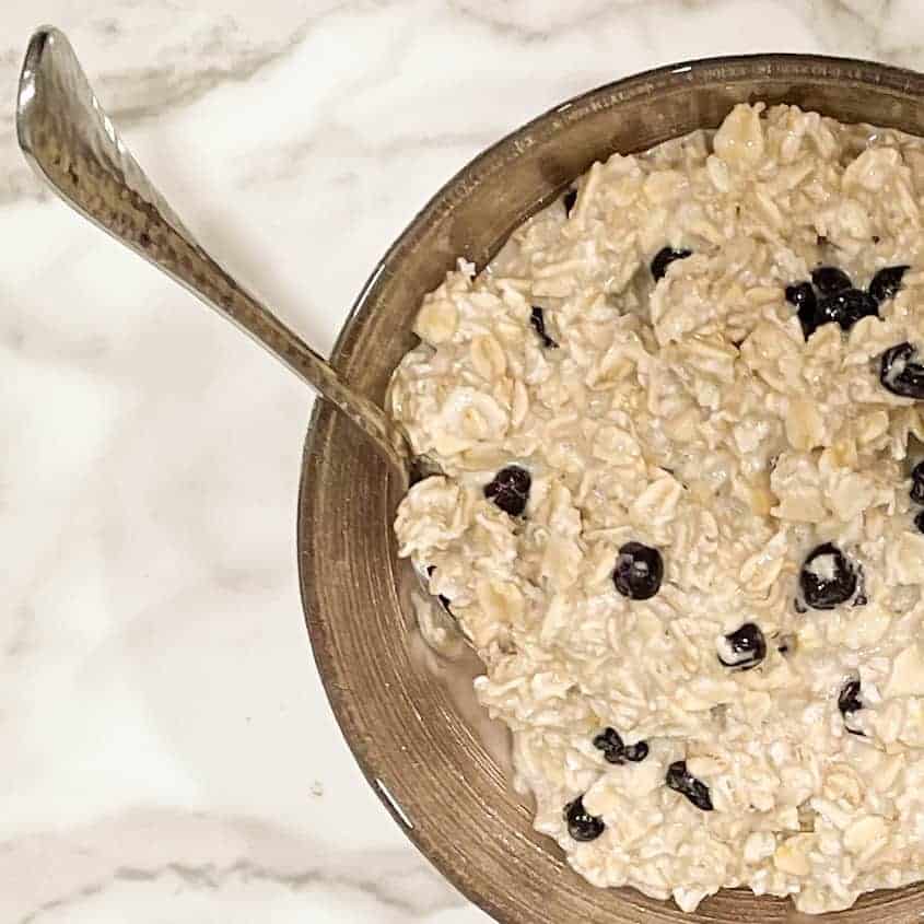 blueberry overnight oats with a spoon