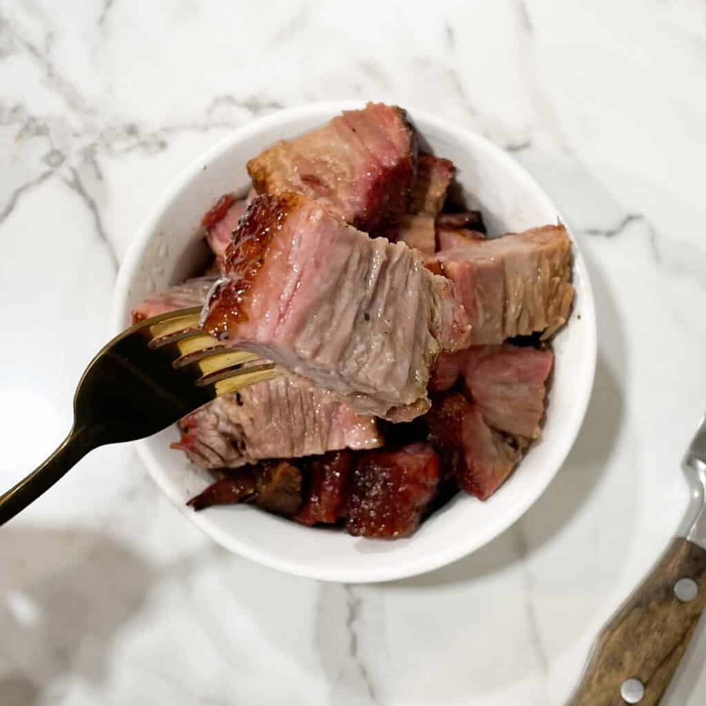 smoked brisket on a fork