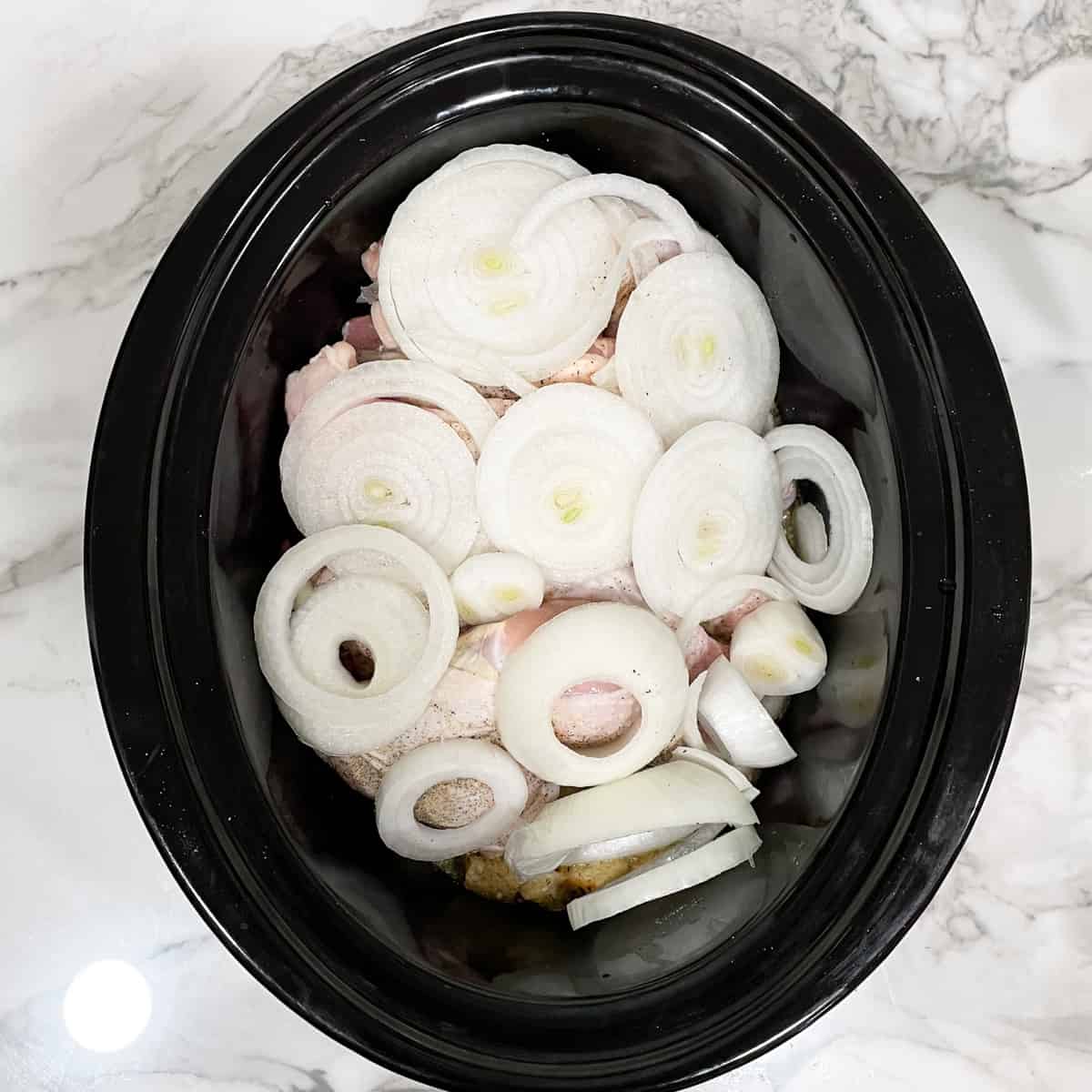 4 ingredient slow cooker chicken top with onions