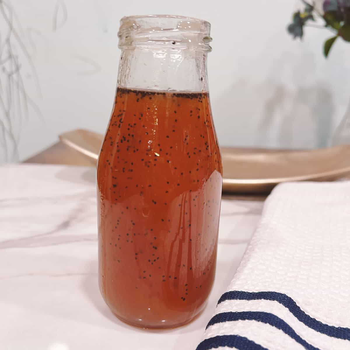 sweet onion sauce in a glass bottle